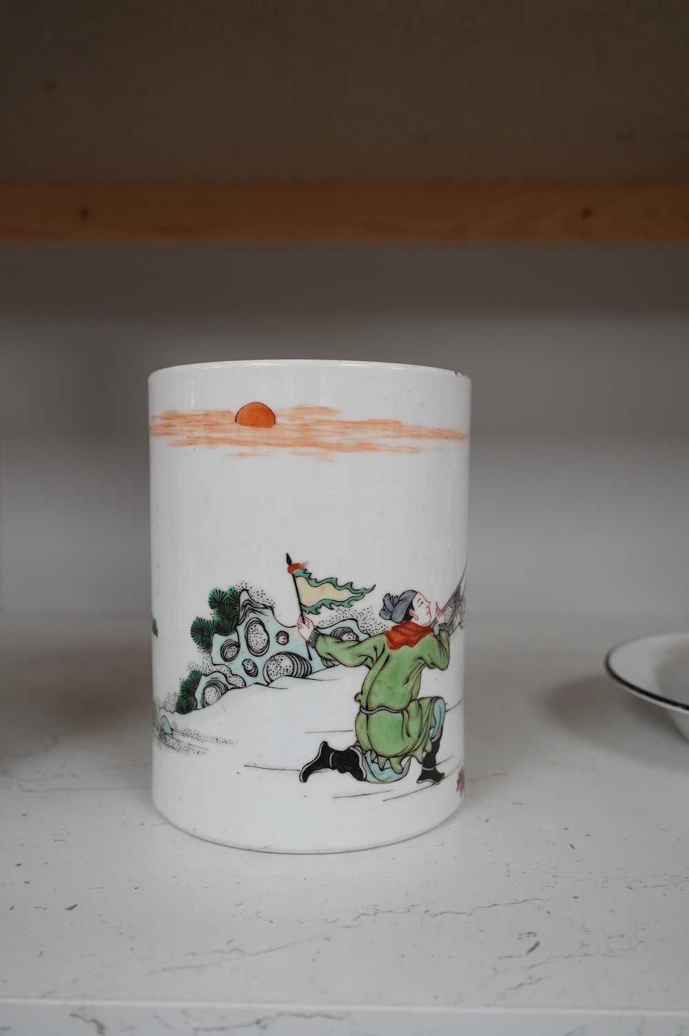 A Chinese famille verte ‘scholars’ brush pot, 15.3cm high